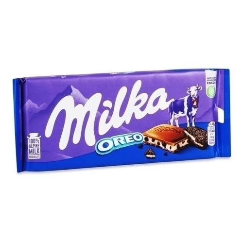 Шоколад Milka молочный с ванильной начинкой и кусочками печенья Орео 100 г